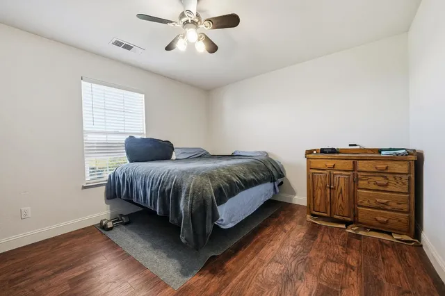 an aerial view of a garden with an ocean beach