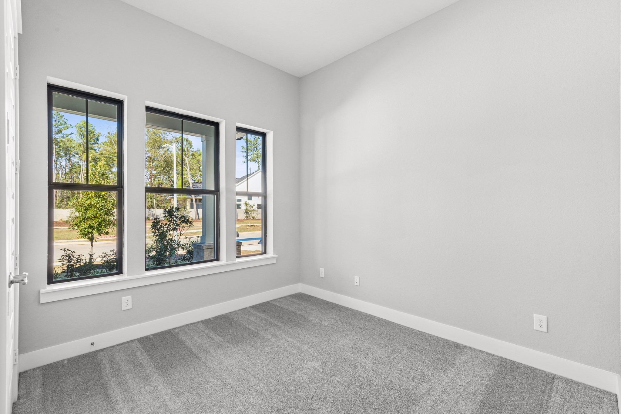 16142 Rita Road Conroe, TX 77302 - Photo 13 of 48 an empty room with a window