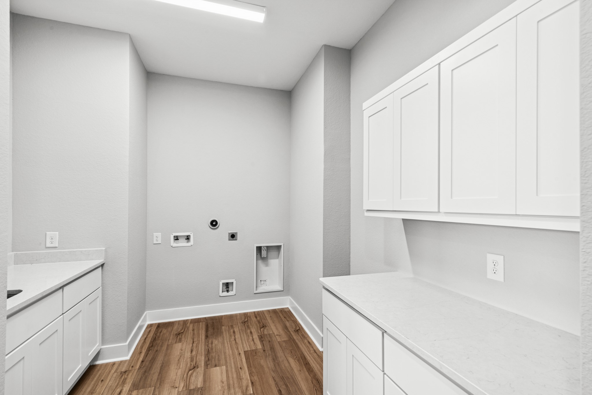 16142 Rita Road Conroe, TX 77302 - Photo 18 of 48 a view of a kitchen with white cabinets