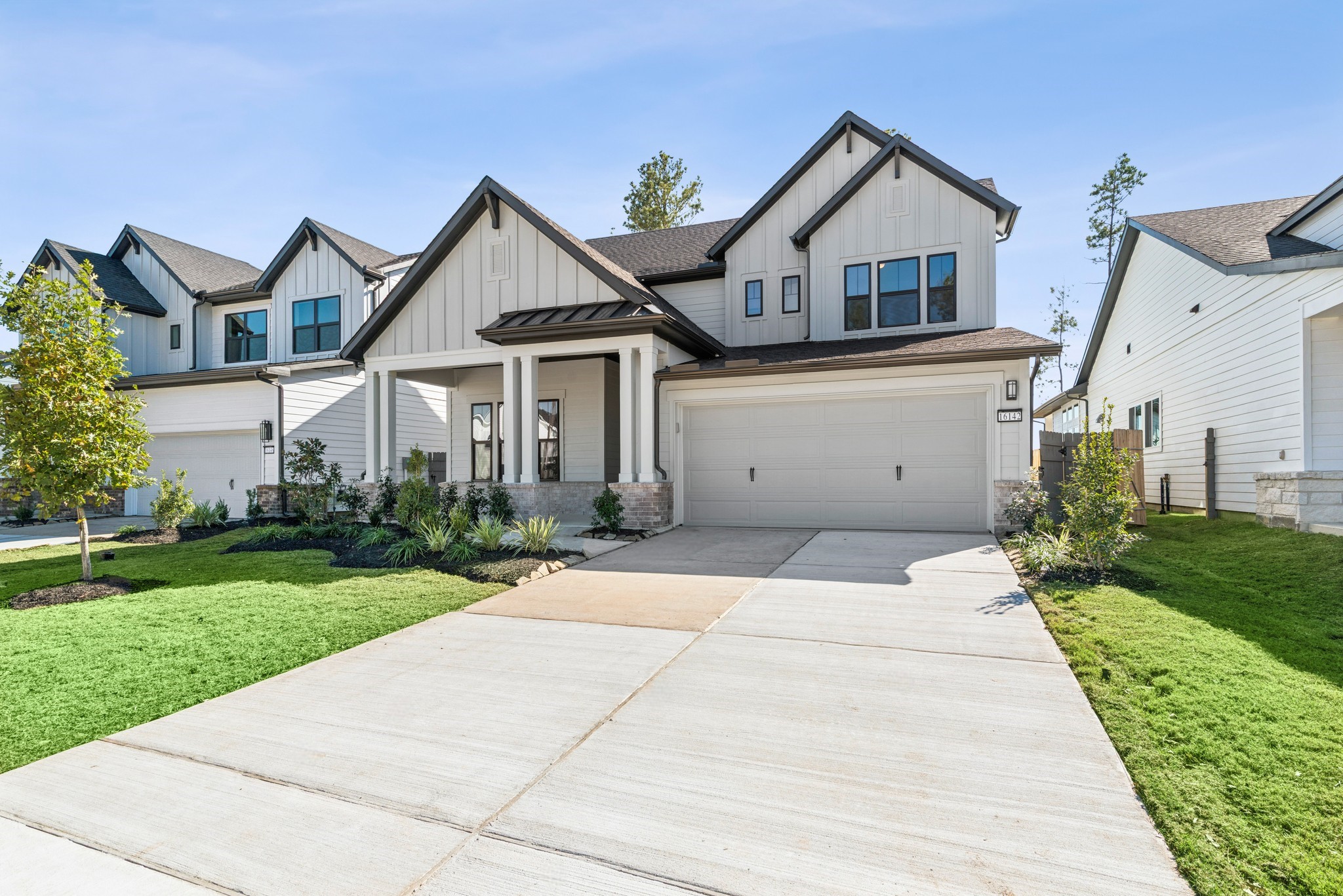 16142 Rita Road Conroe, TX 77302 - Photo 2 of 48 a view of house and garden