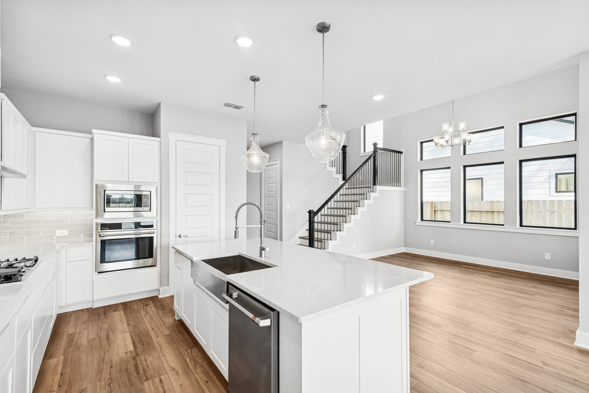 16142 Rita Road Conroe, TX 77302 - Photo 22 of 48 a kitchen with a sink appliances and cabinets