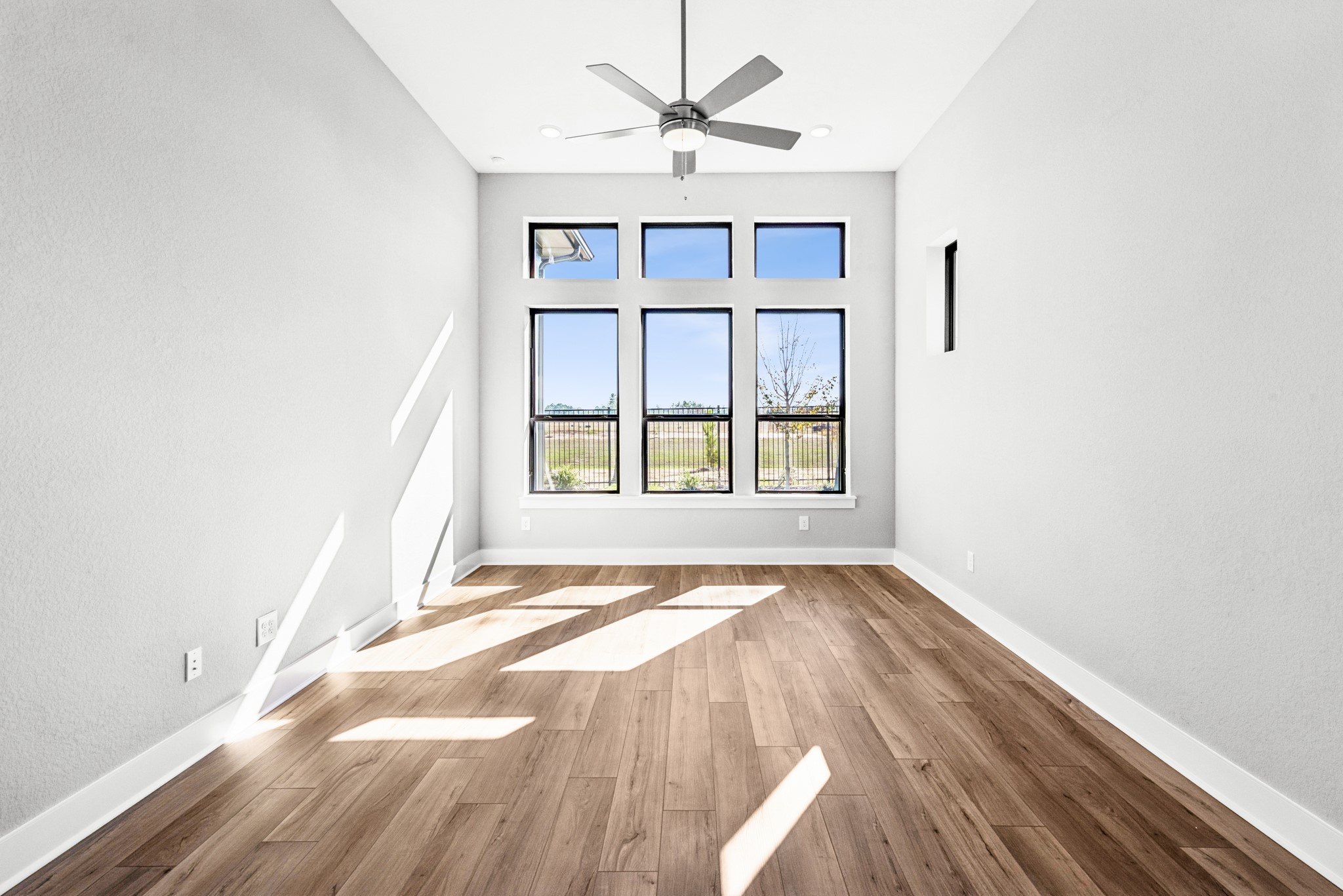 16142 Rita Road Conroe, TX 77302 - Photo 27 of 48 a view of an empty room with a window
