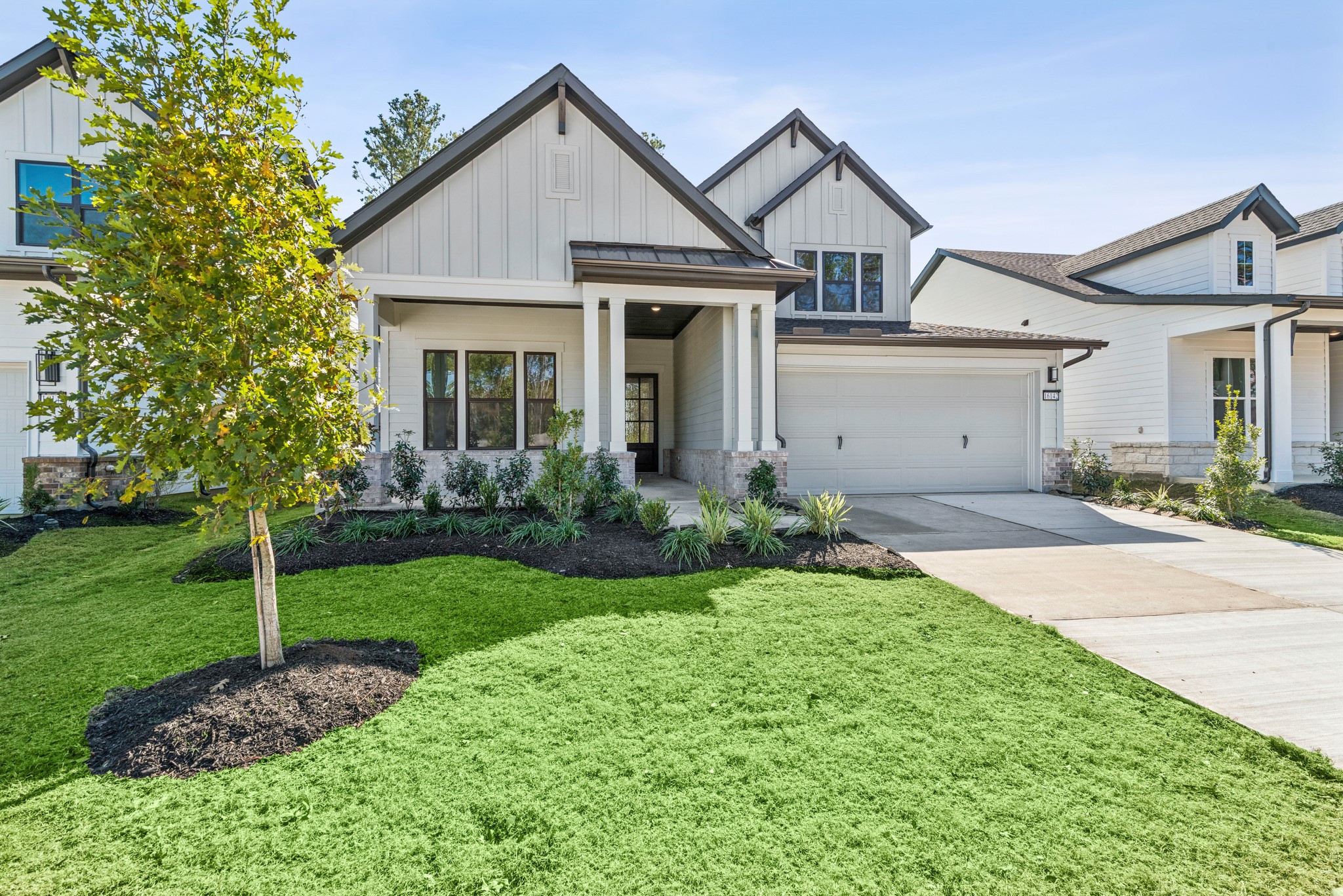 16142 Rita Road Conroe, TX 77302 - Photo 3 of 48 a view of a house with garden and plants