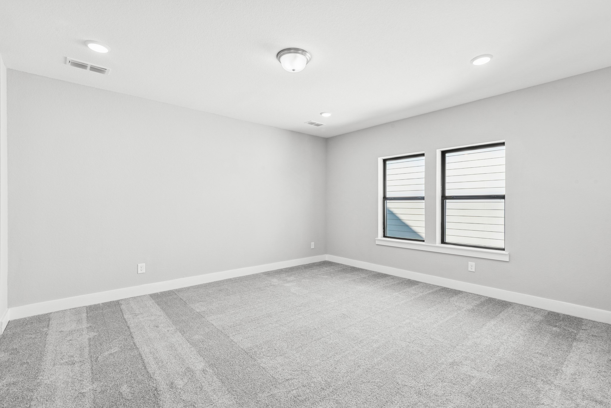 16142 Rita Road Conroe, TX 77302 - Photo 33 of 48 an empty room with a window