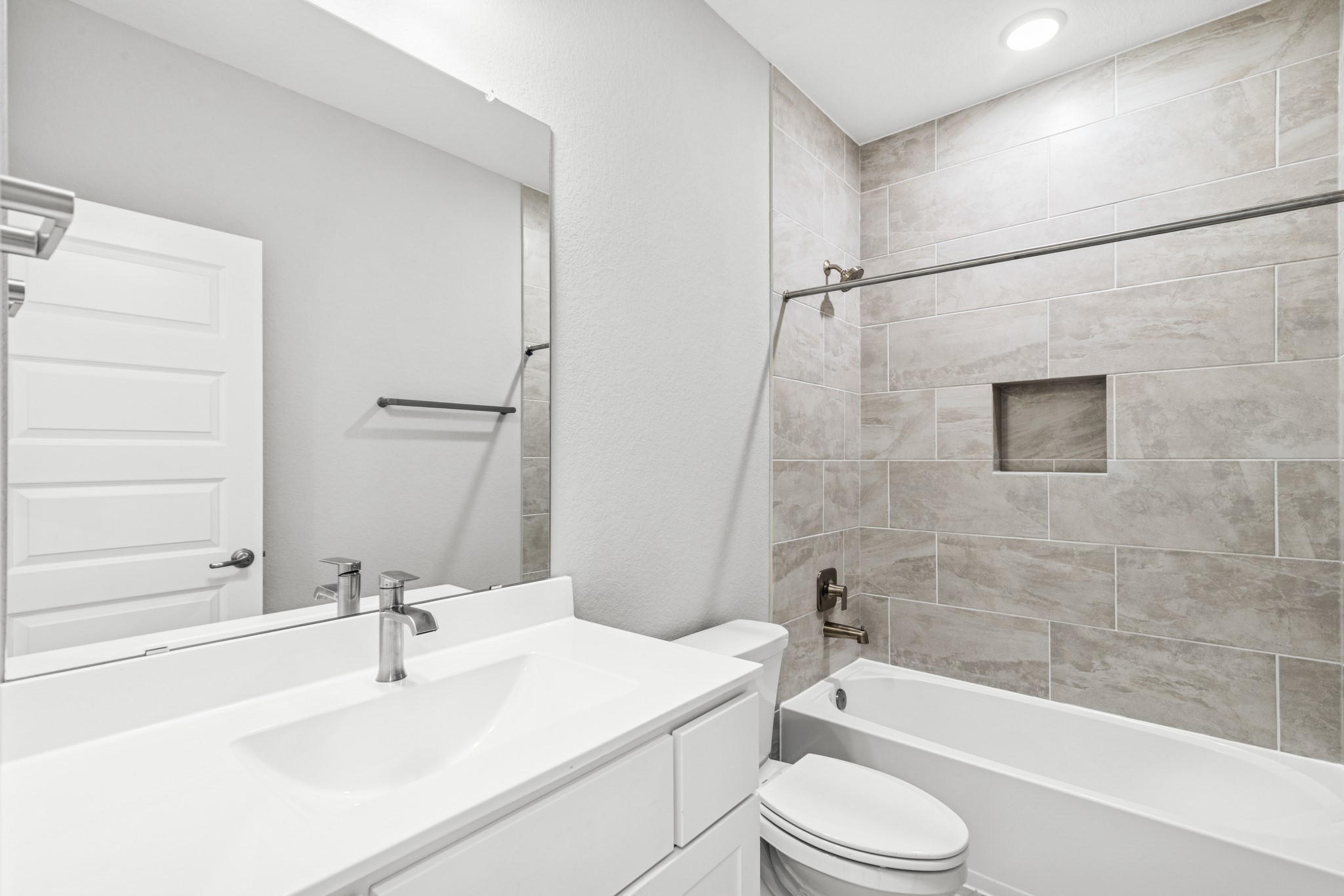 16142 Rita Road Conroe, TX 77302 - Photo 38 of 48 a bathroom with a sink a toilet and shower