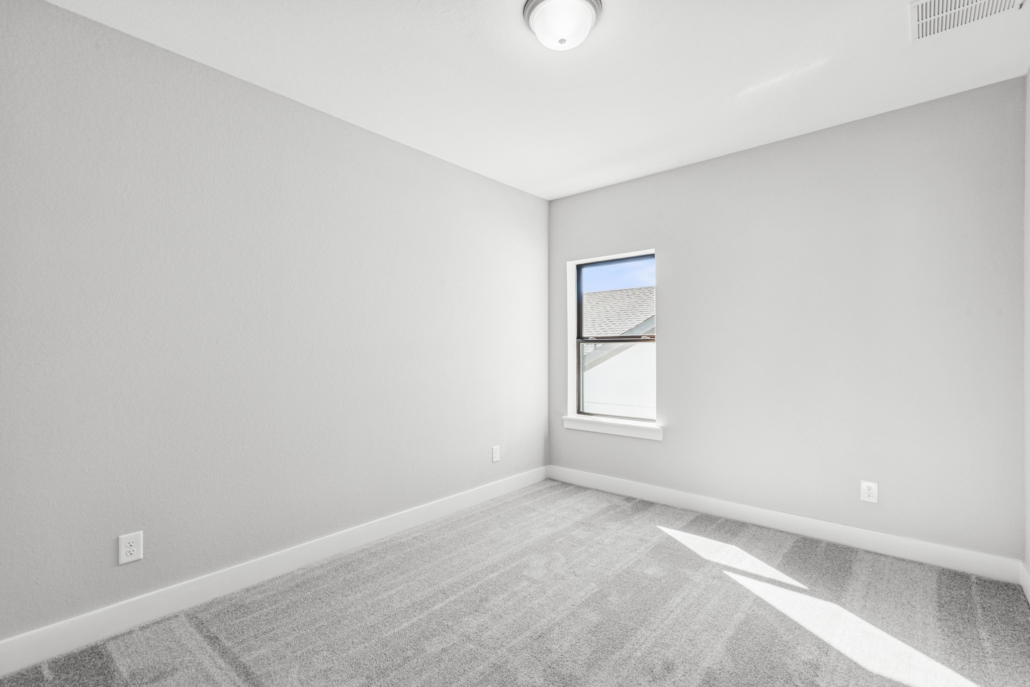 16142 Rita Road Conroe, TX 77302 - Photo 39 of 48 an empty room with a window