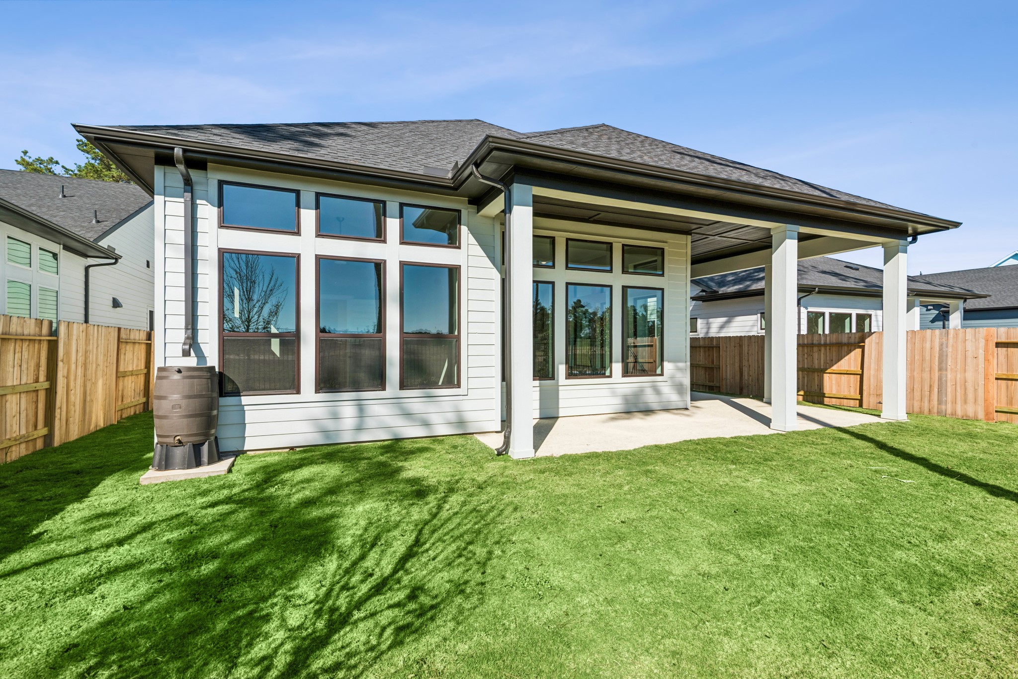 16142 Rita Road Conroe, TX 77302 - Photo 7 of 48 front view of a house with a yard
