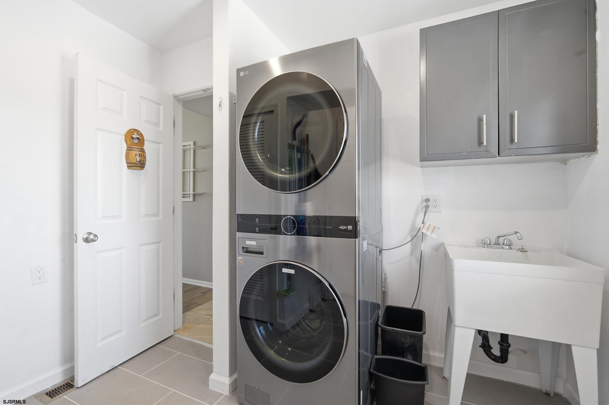 214 Hagen Road Brigantine, NJ 08203 - Photo 29 of 34 a utility room with sink dryer and washer