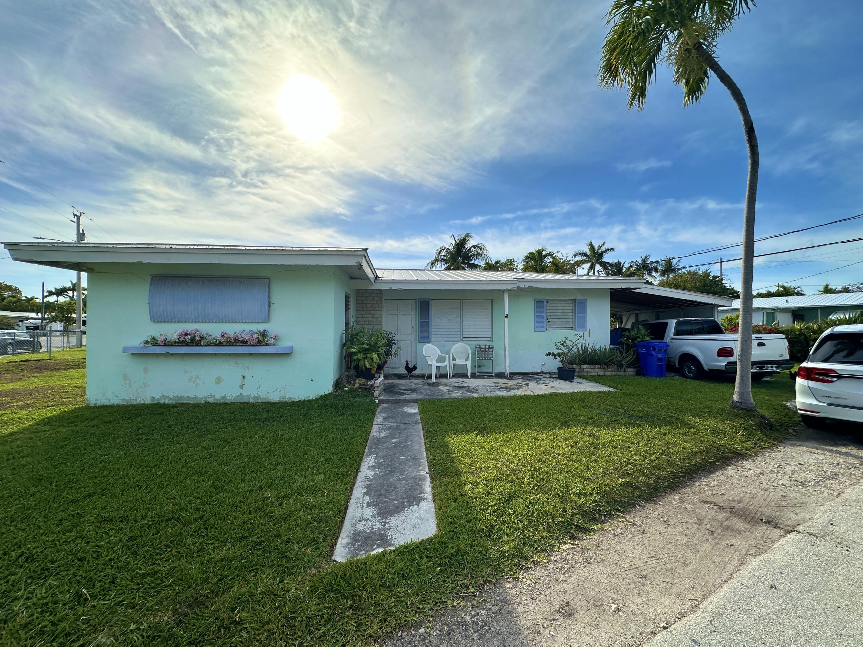1521 Rose Street Key West, FL 33040 - Photo 8 of 13 a view of a house with a back yard