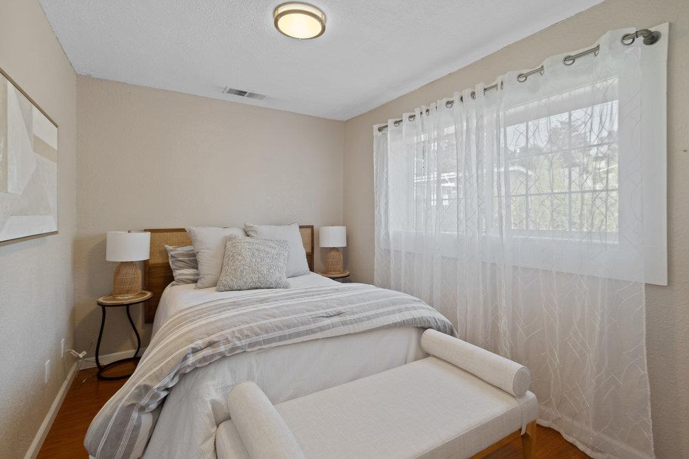 19 Jolley Way Scotts Valley, CA 95066 - Photo 17 of 56 a bedroom with a bed and a mirror