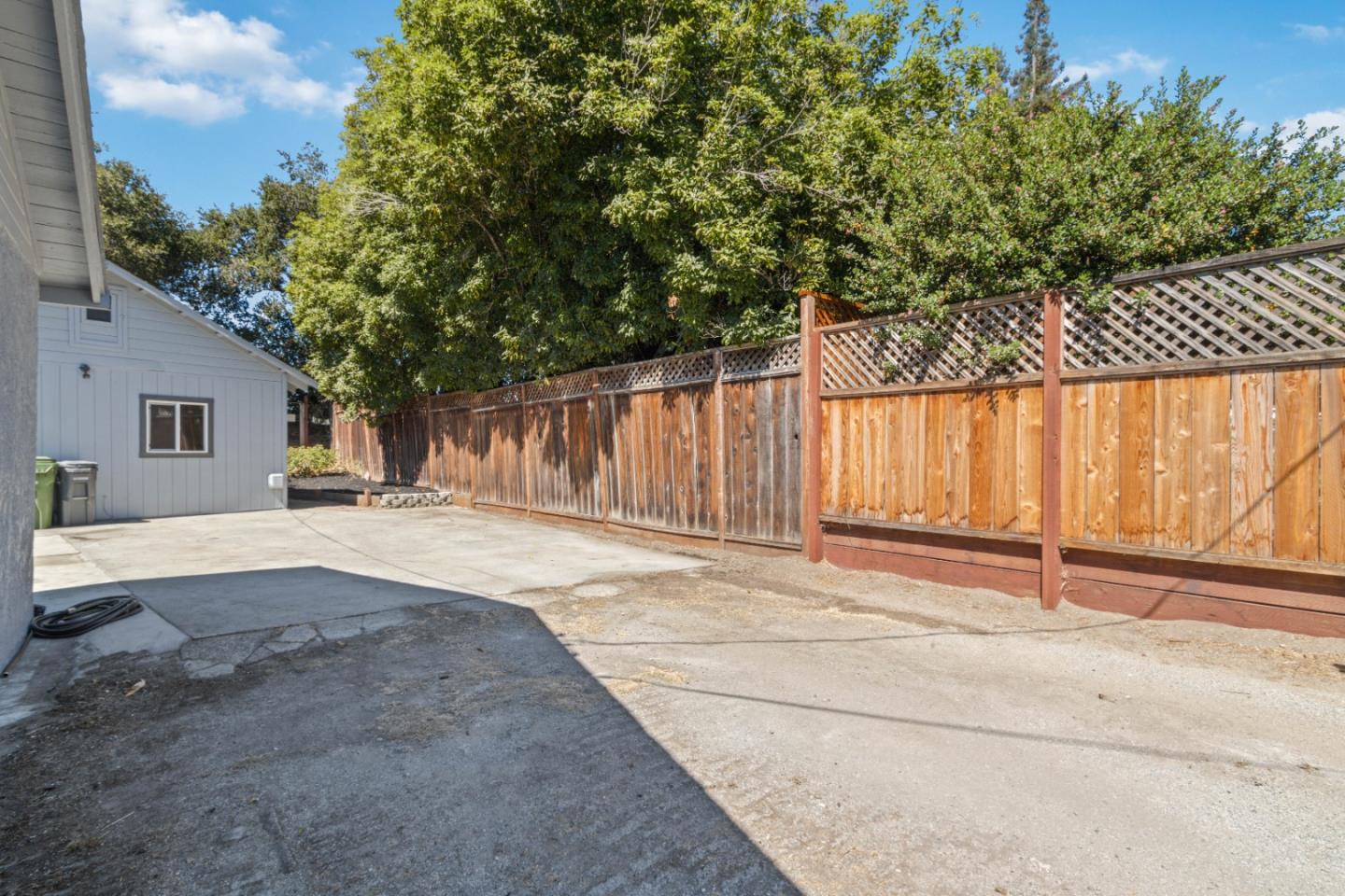 19 Jolley Way Scotts Valley, CA 95066 - Photo 34 of 56 a view of backyard with wooden fence and a bench