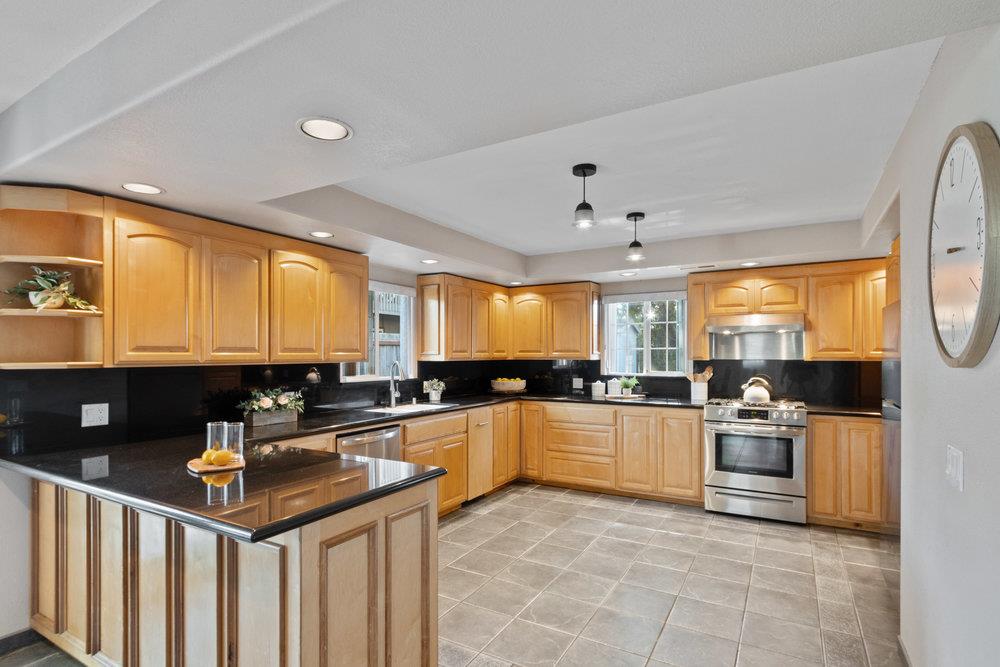 19 Jolley Way Scotts Valley, CA 95066 - Photo 8 of 56 a kitchen with stainless steel appliances a stove sink and cabinets