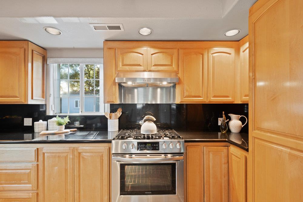 19 Jolley Way Scotts Valley, CA 95066 - Photo 10 of 56 a kitchen with a stove a sink and a window