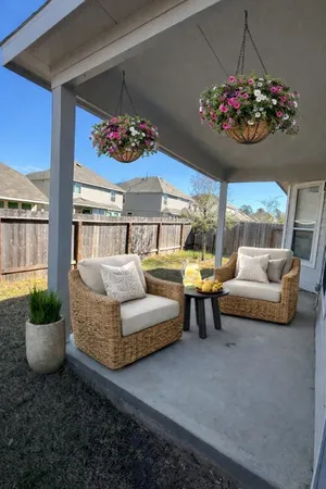 a view of a house with a backyard
