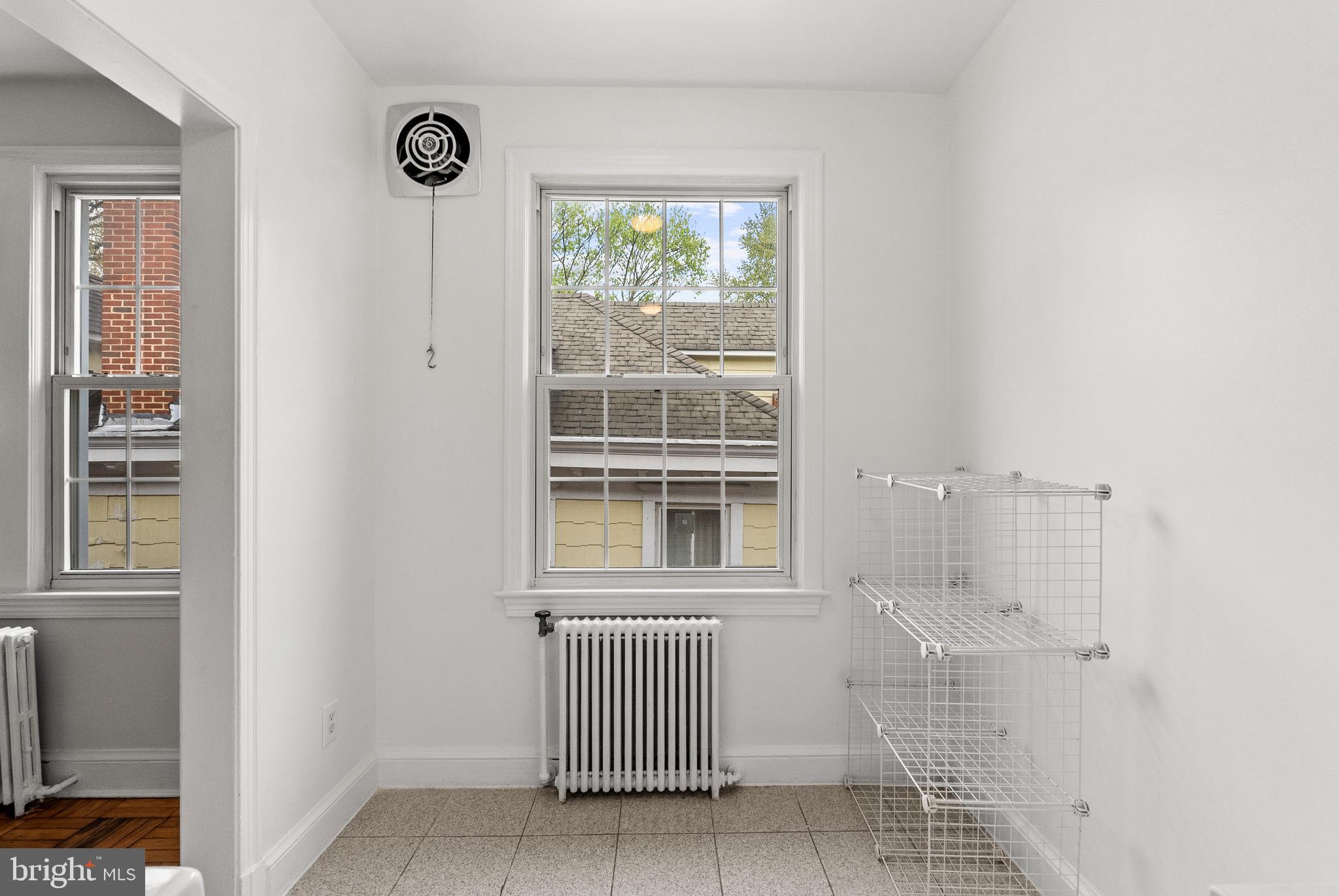 4491 MacArthur Boulevard Northwest, Unit 303 Washington, DC 20007 - Photo 11 of 37 an entryway with a window and bathroom