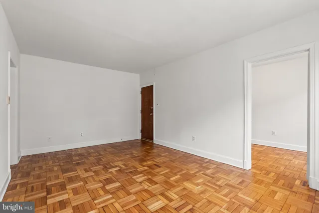 a workspace with furniture and book shelf