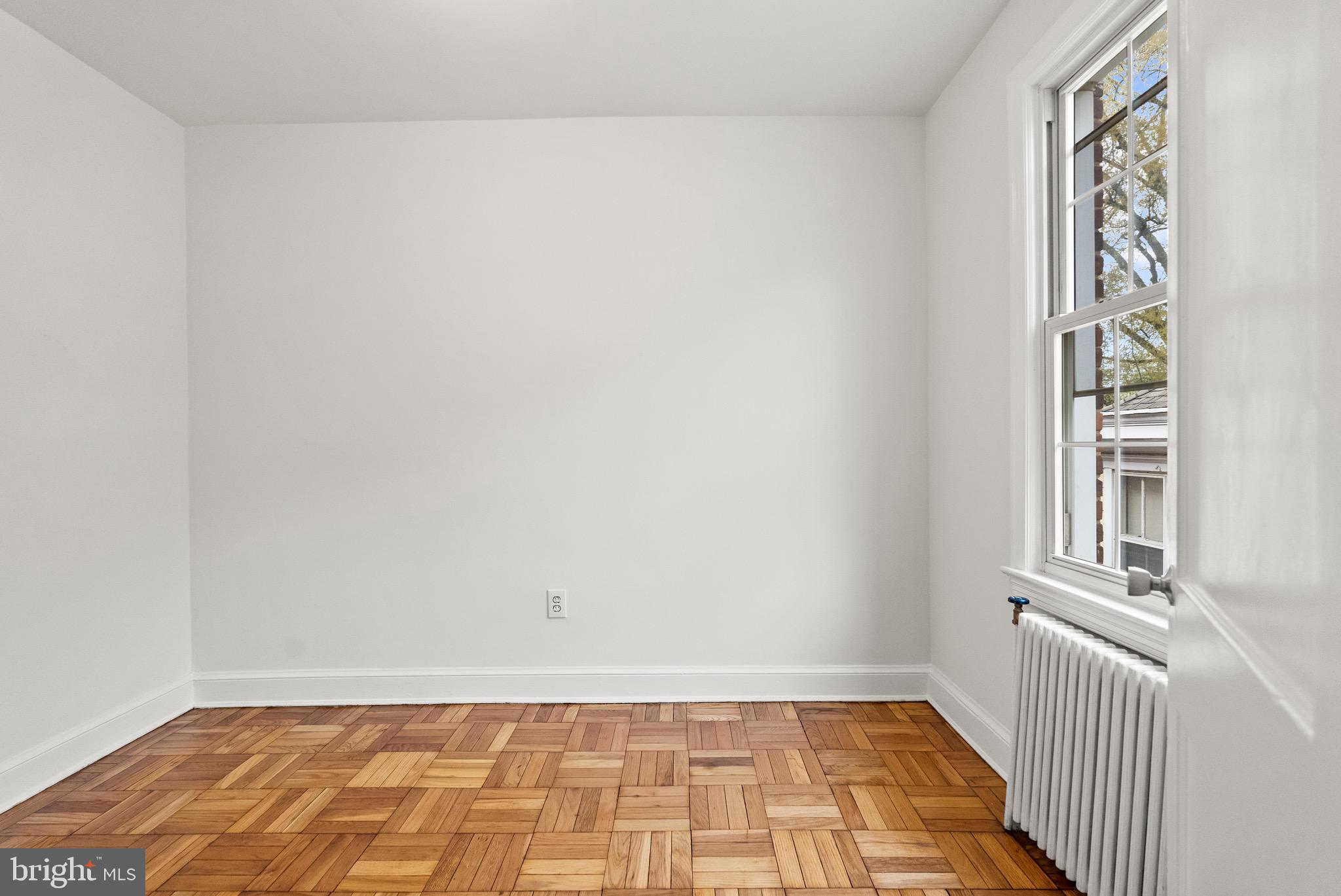 4491 MacArthur Boulevard Northwest, Unit 303 Washington, DC 20007 - Photo 17 of 37 a view of an empty room and a window