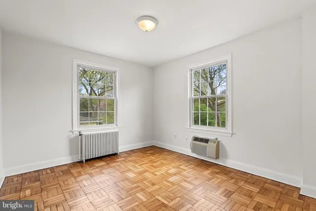 a bathroom with a sink toilet vanity and bathtub