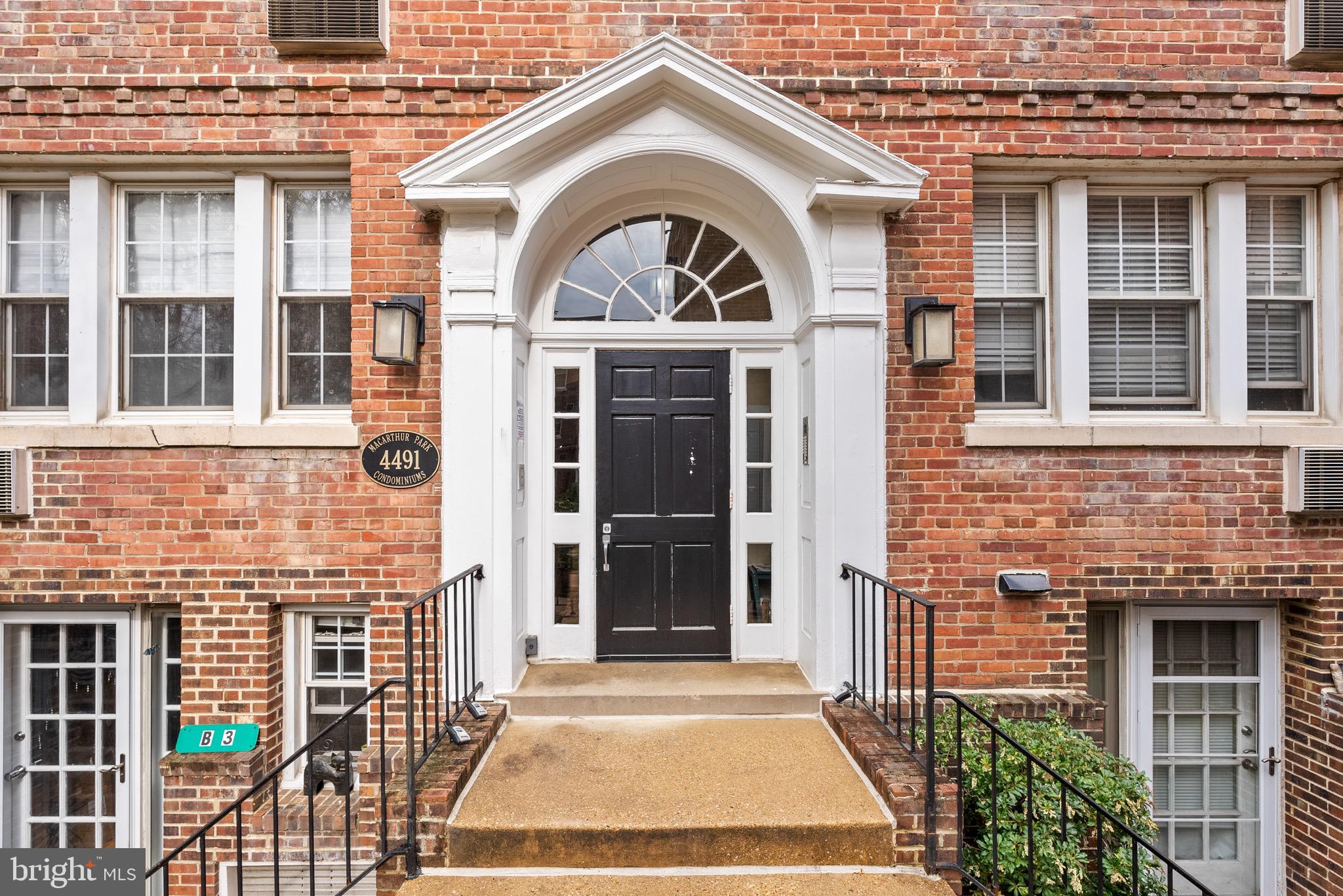 4491 MacArthur Boulevard Northwest, Unit 303 Washington, DC 20007 - Photo 24 of 37 a front view of a house with glass windows