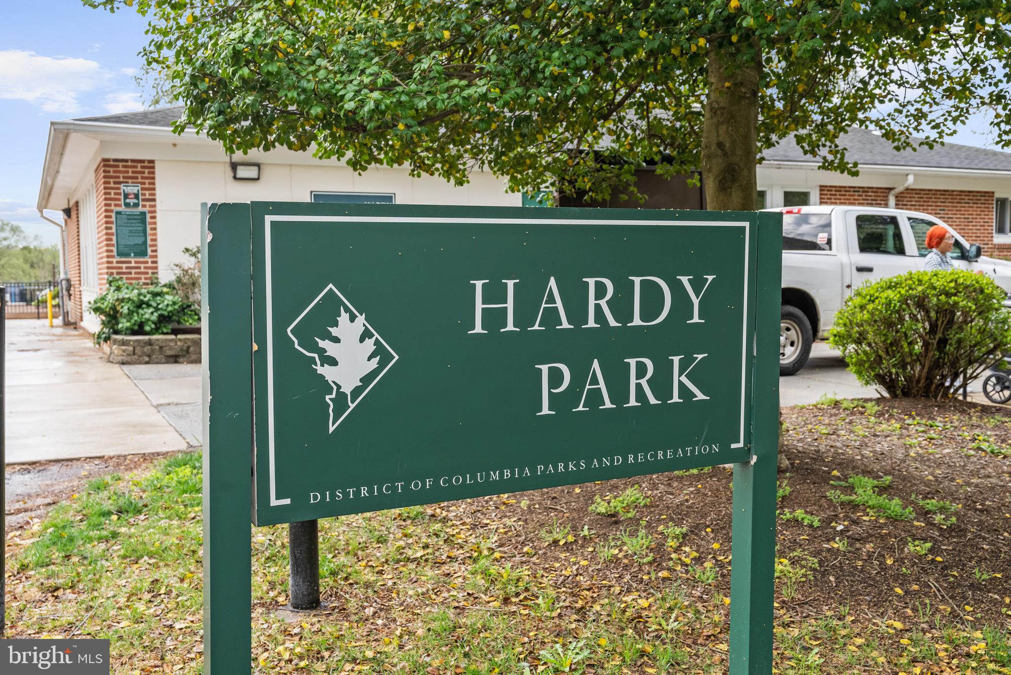 4491 MacArthur Boulevard Northwest, Unit 303 Washington, DC 20007 - Photo 28 of 37 a sign broad on the side of the road