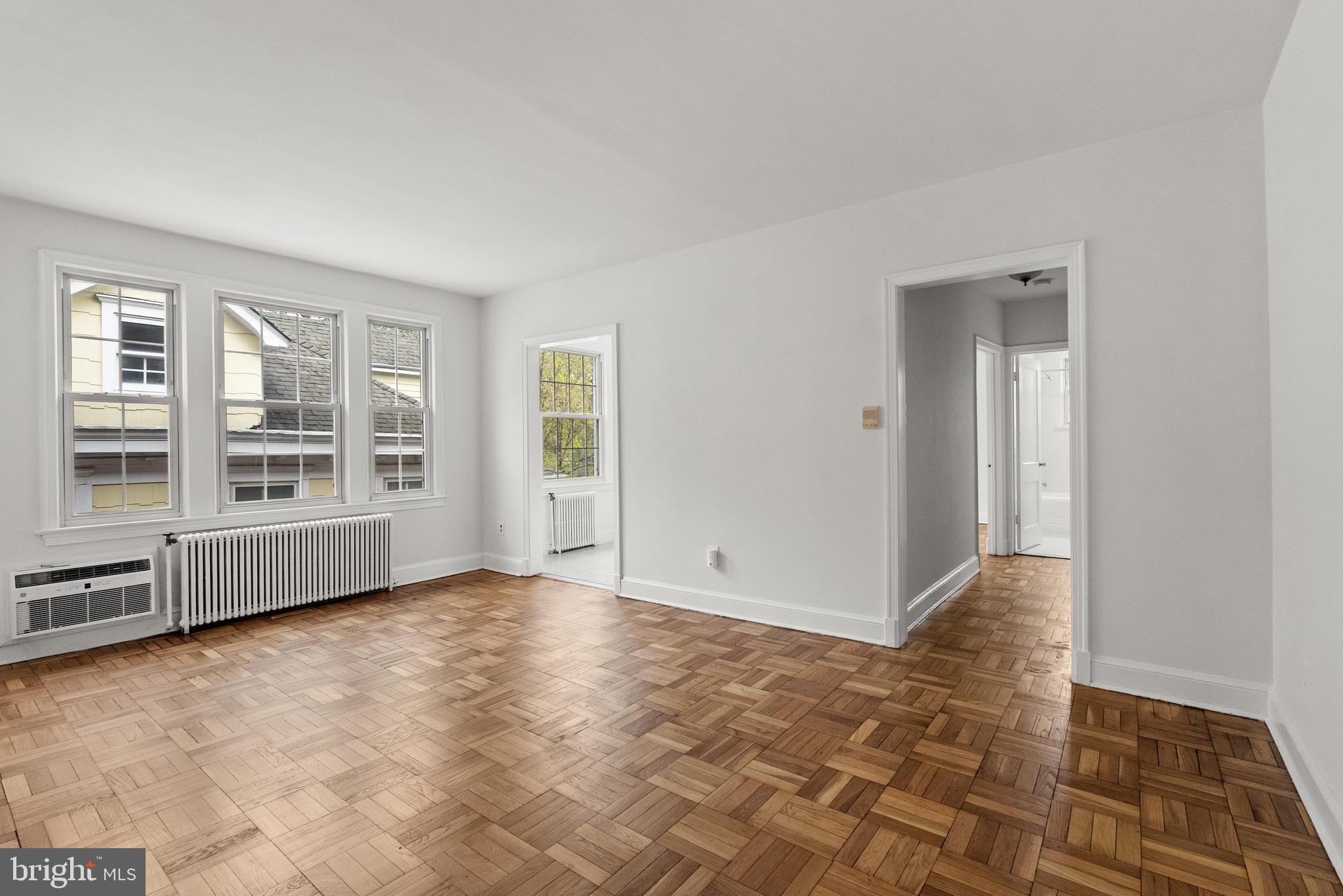 4491 MacArthur Boulevard Northwest, Unit 303 Washington, DC 20007 - Photo 3 of 37 a view of an empty room with a window