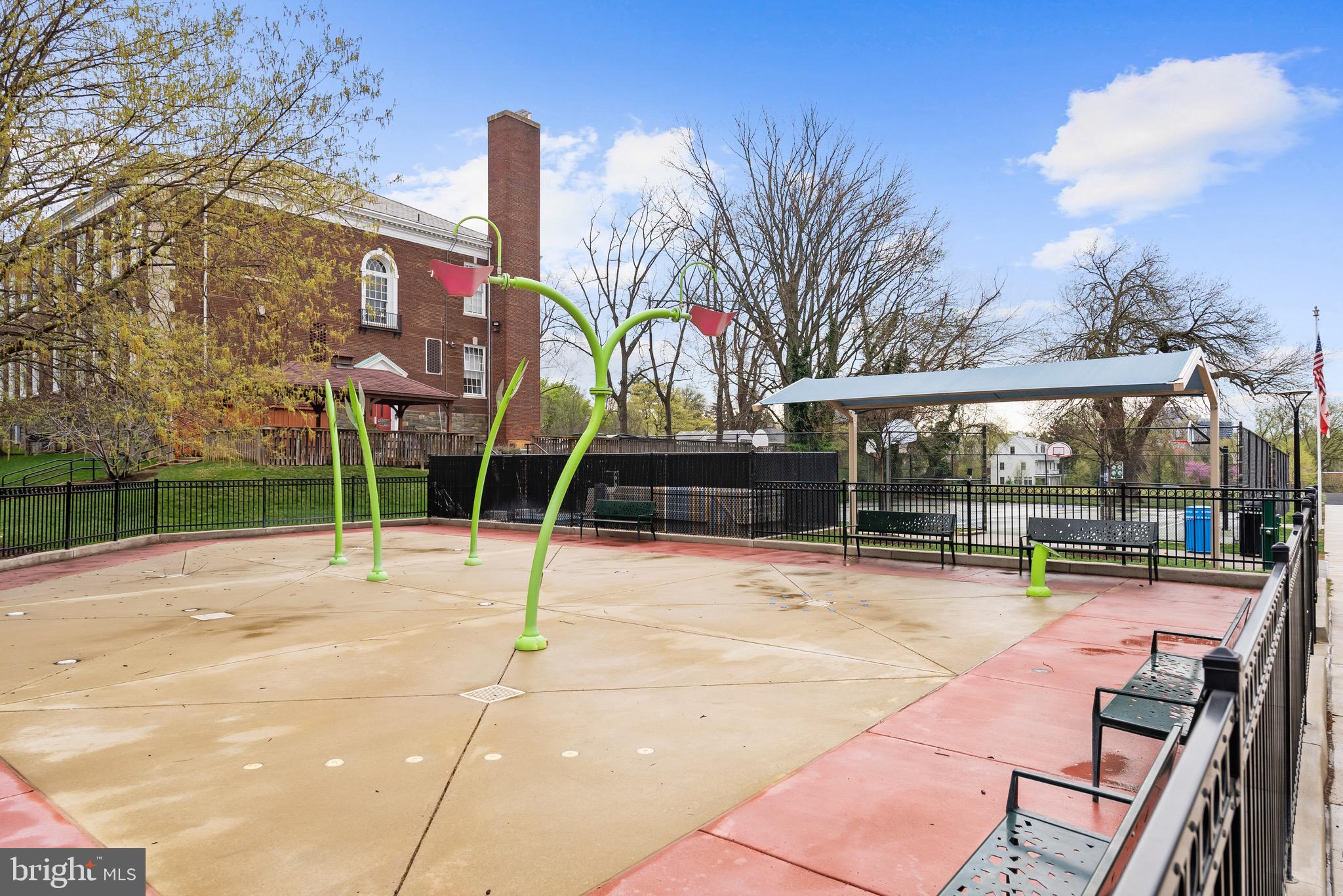 4491 MacArthur Boulevard Northwest, Unit 303 Washington, DC 20007 - Photo 35 of 37 a view of a swimming pool with a patio
