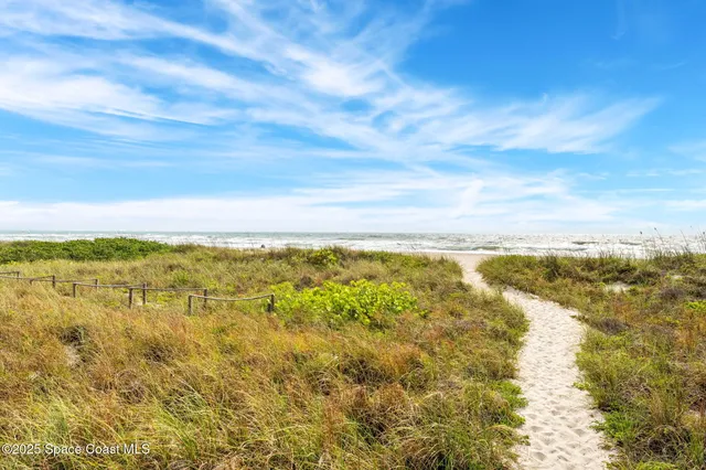 a view of a balcony with city view