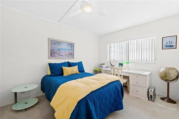 a bed room with a bed and a couch