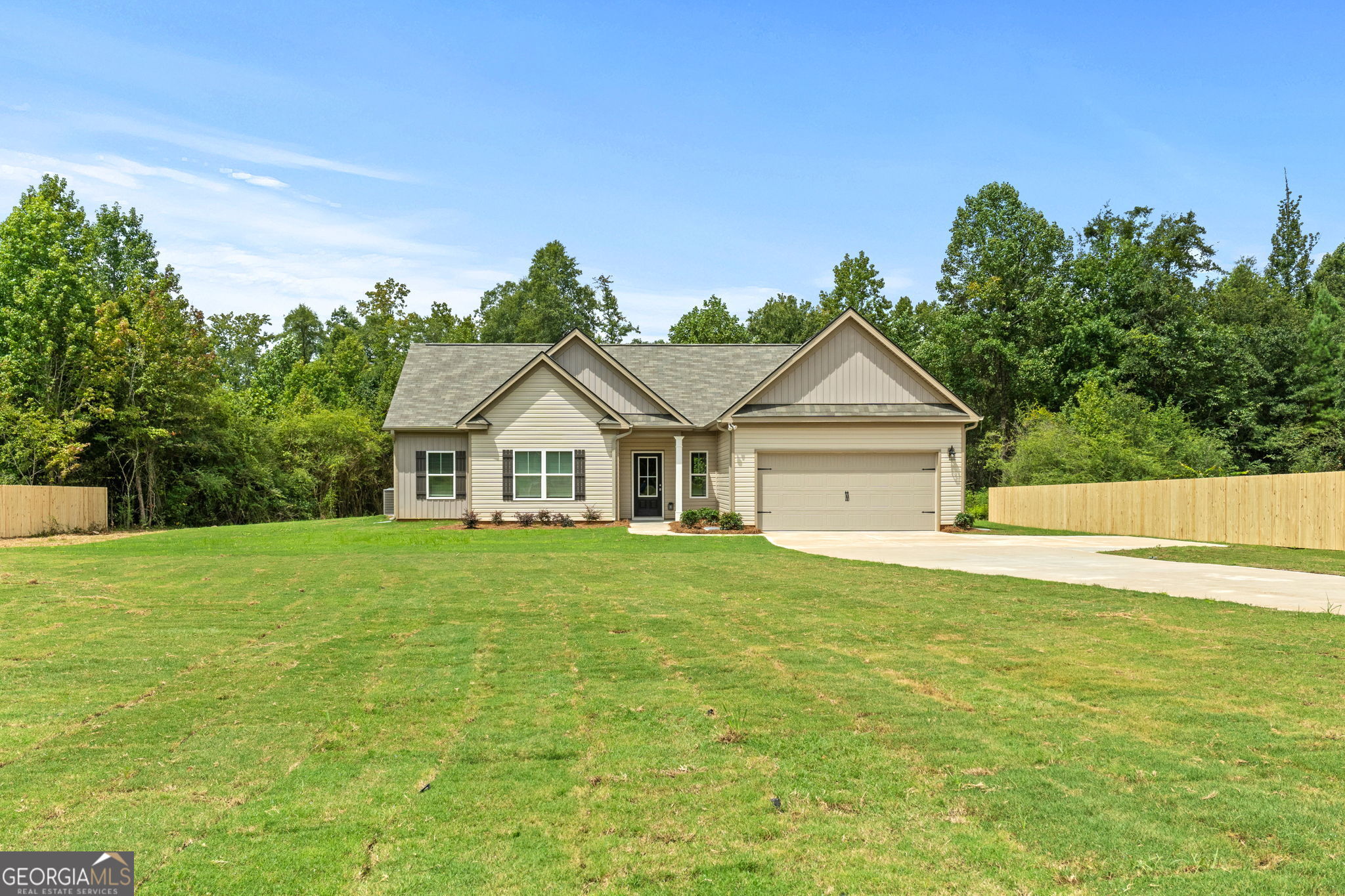 294 Ike Williams Road Gay, GA 30218 - Photo 1 of 1 a view of a house with a yard and a garden