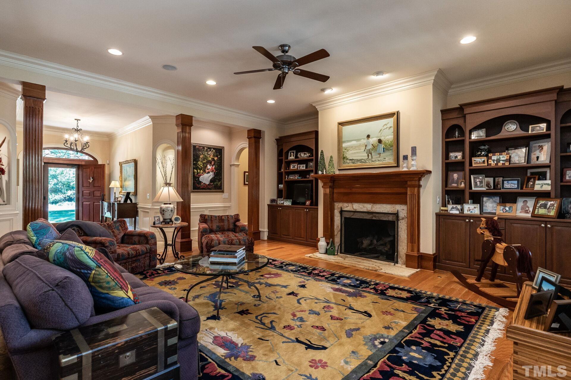 3120 Darien Drive Raleigh, NC 27607 - Photo 9 of 55 a living room with furniture and a fireplace