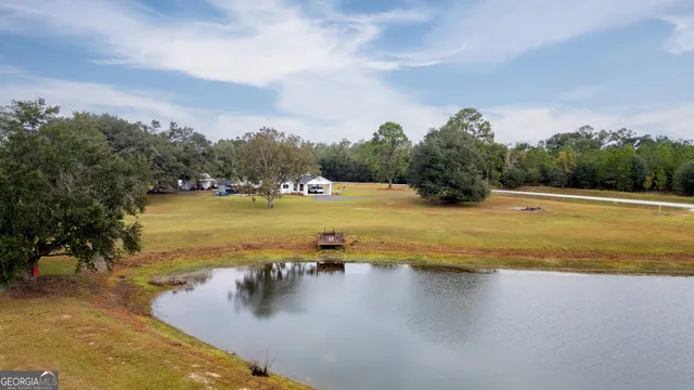 a front view of house with outdoor seating