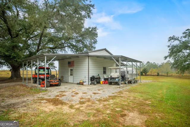a large kitchen with a table and chairs