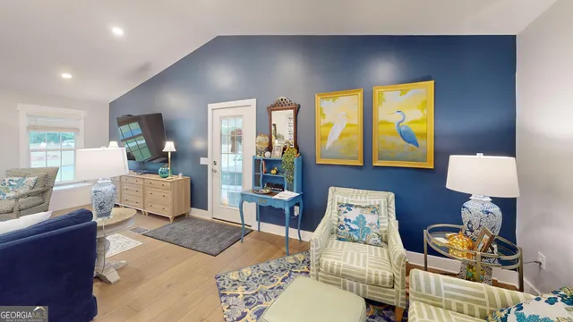 a bathroom with a sink mirror and vanity