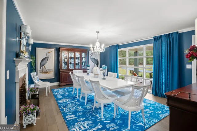 a spacious bathroom with a double vanity sink a mirror and shower