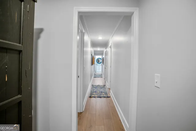 a bedroom with a bed and walk in closet