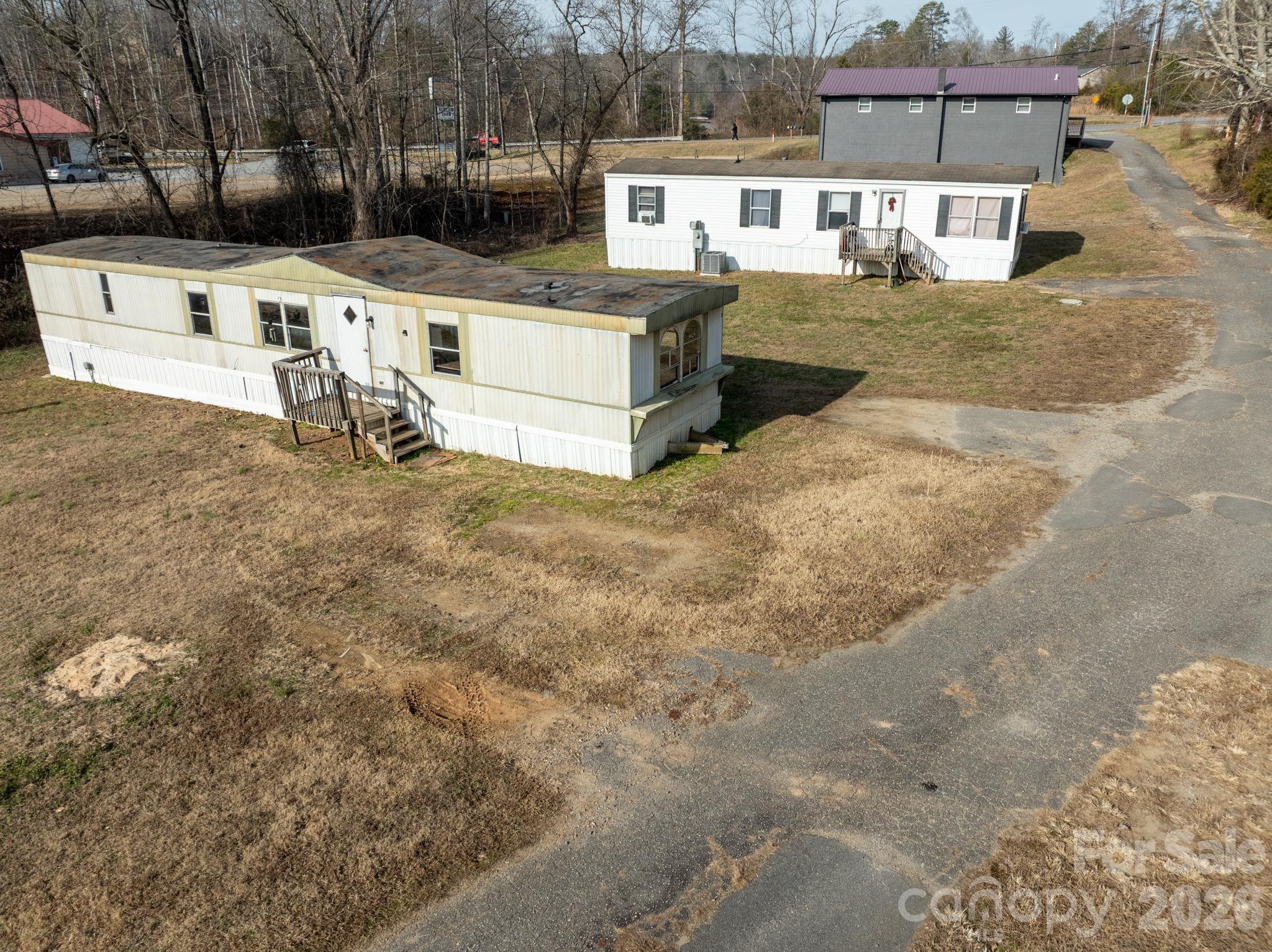 3036 Highway 18 Morganton, NC 28655 - Photo 12 of 28 a view of a yard with table and chairs