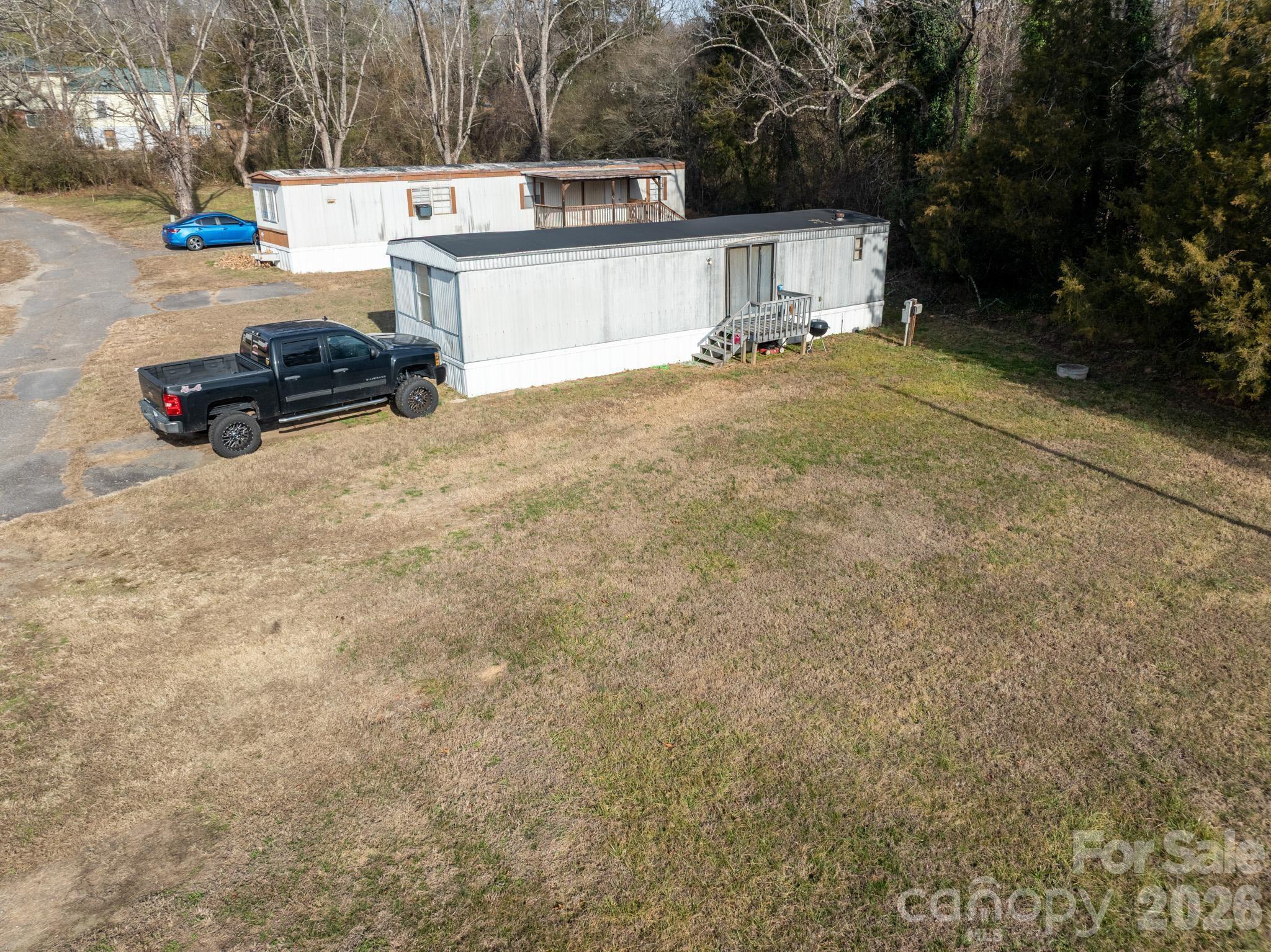3036 Highway 18 Morganton, NC 28655 - Photo 13 of 28 a view of kitchen with refrigerator and trees