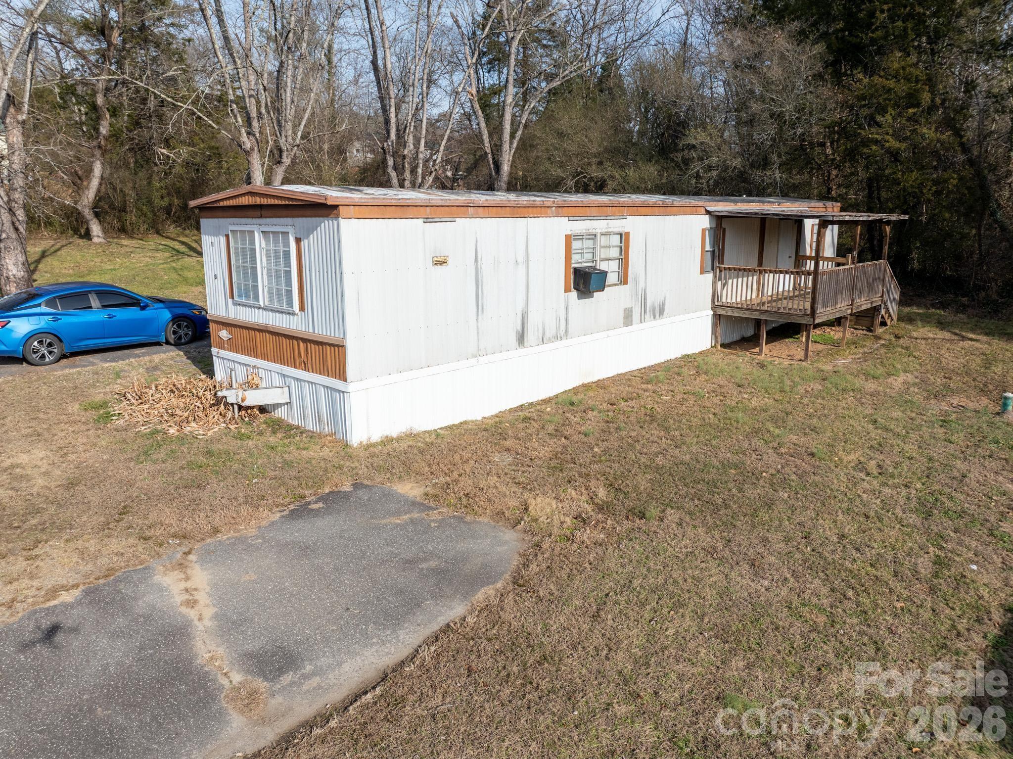 3036 Highway 18 Morganton, NC 28655 - Photo 14 of 28 a view of a house with a backyard