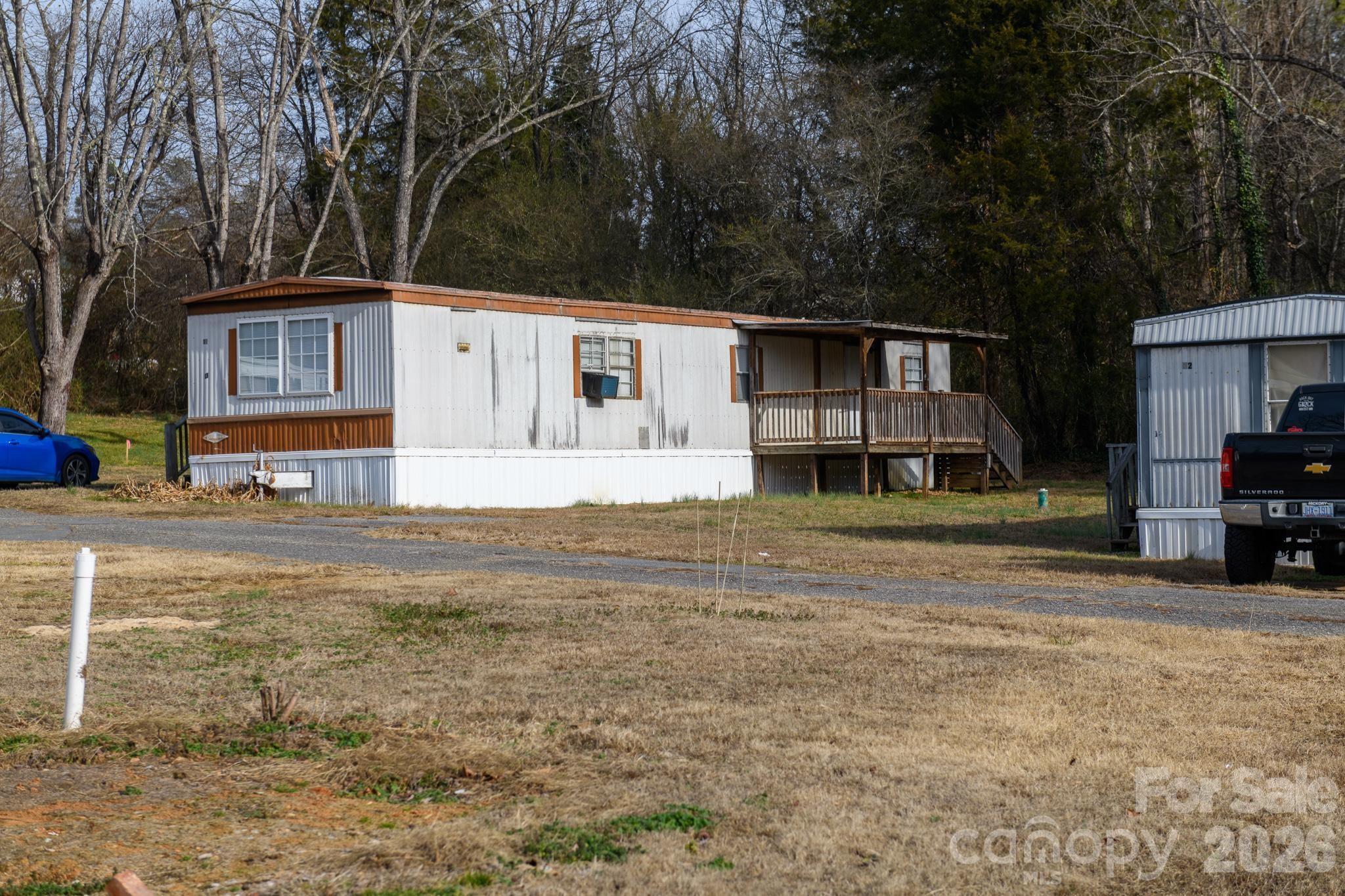 3036 Highway 18 Morganton, NC 28655 - Photo 20 of 28 a house that has a tree in front of it