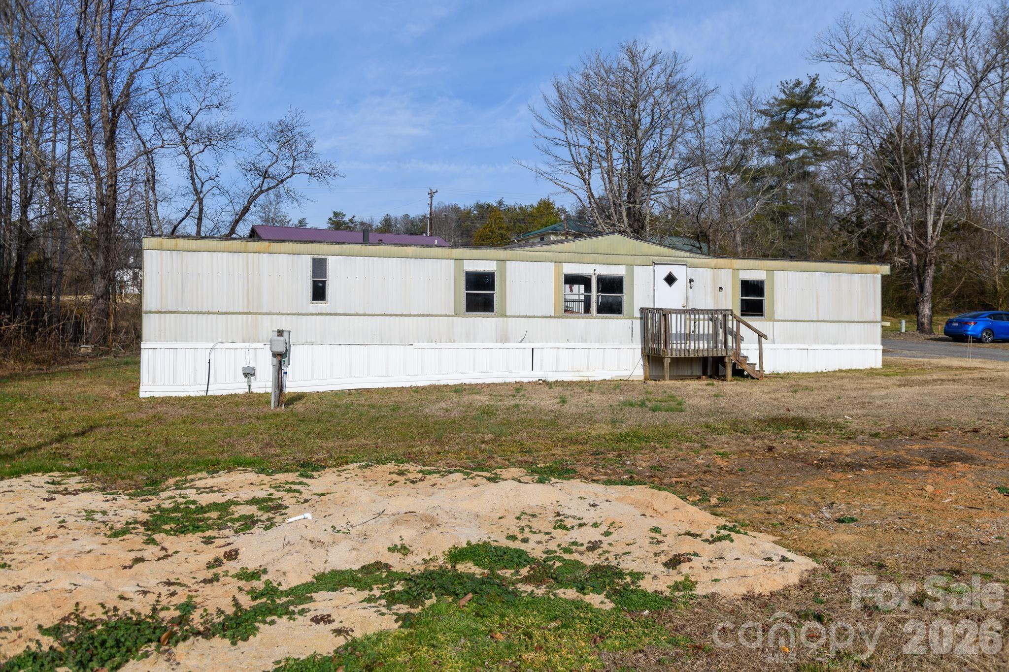 3036 Highway 18 Morganton, NC 28655 - Photo 21 of 28 a view of a yard with large tree