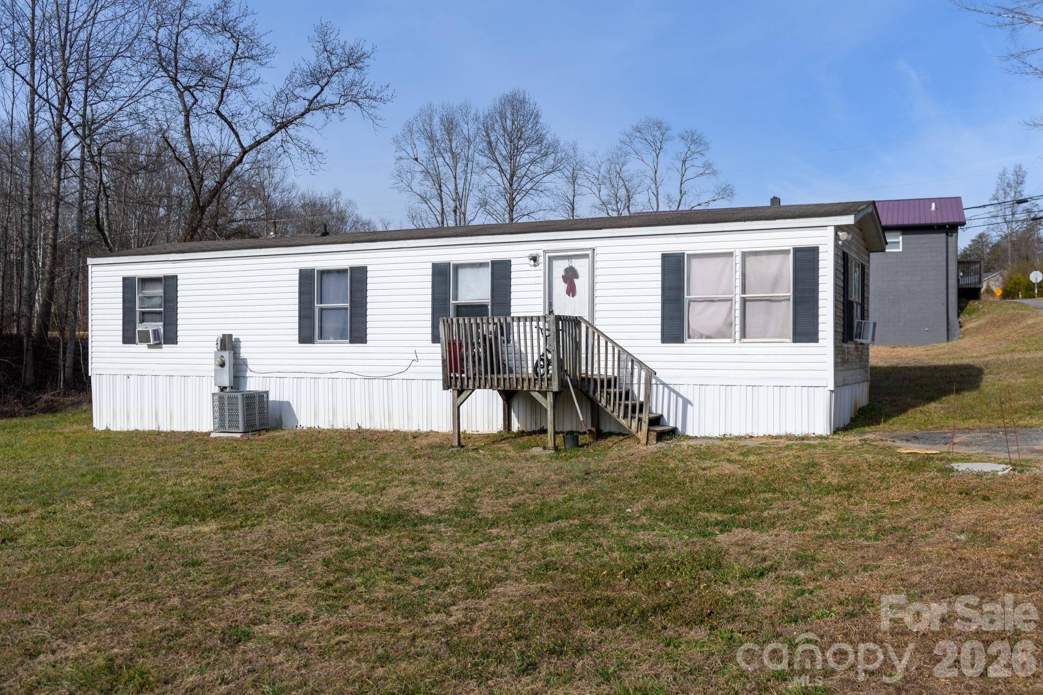 3036 Highway 18 Morganton, NC 28655 - Photo 23 of 28 a view of a house with a yard