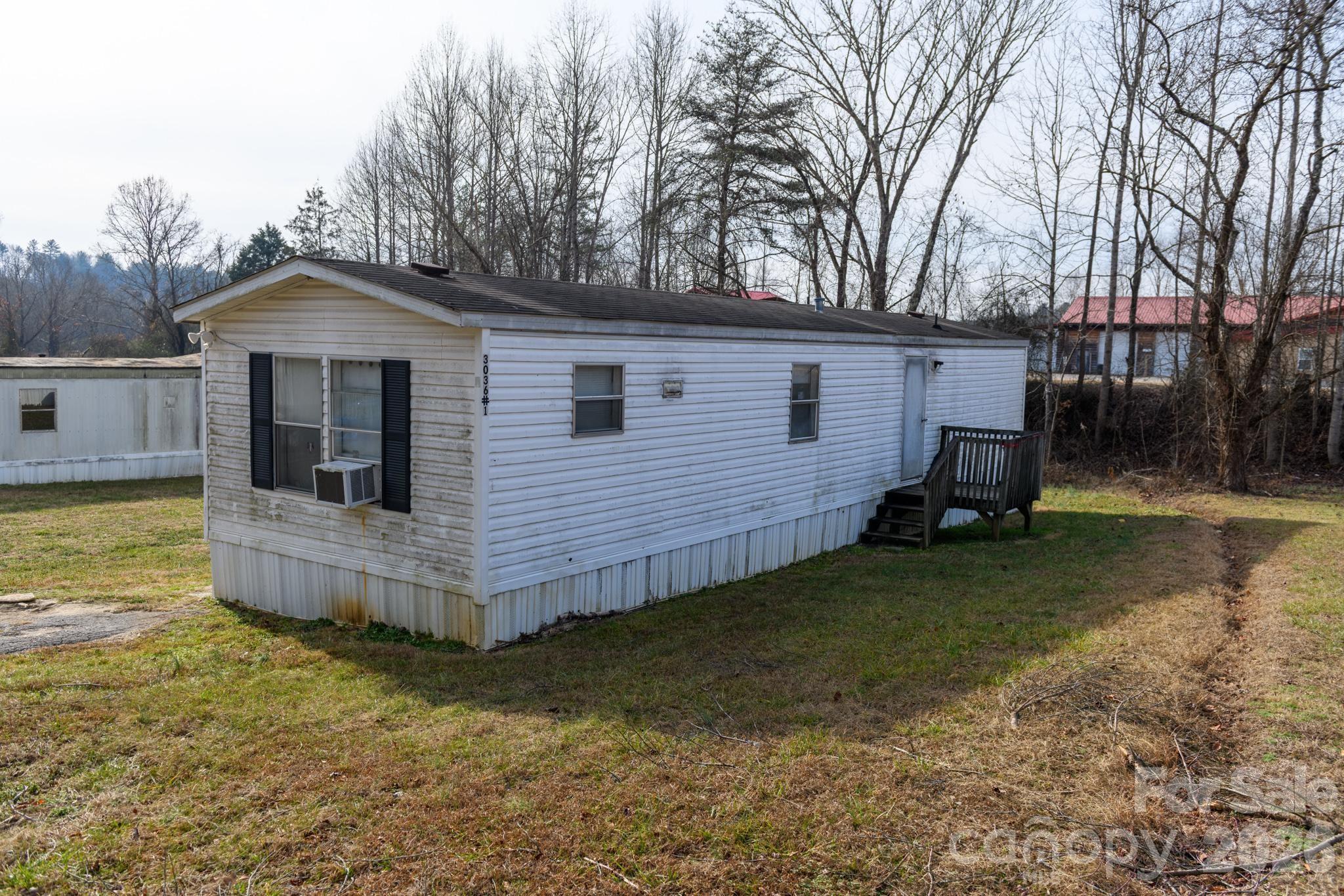 3036 Highway 18 Morganton, NC 28655 - Photo 28 of 28 a view of a backyard with a garden