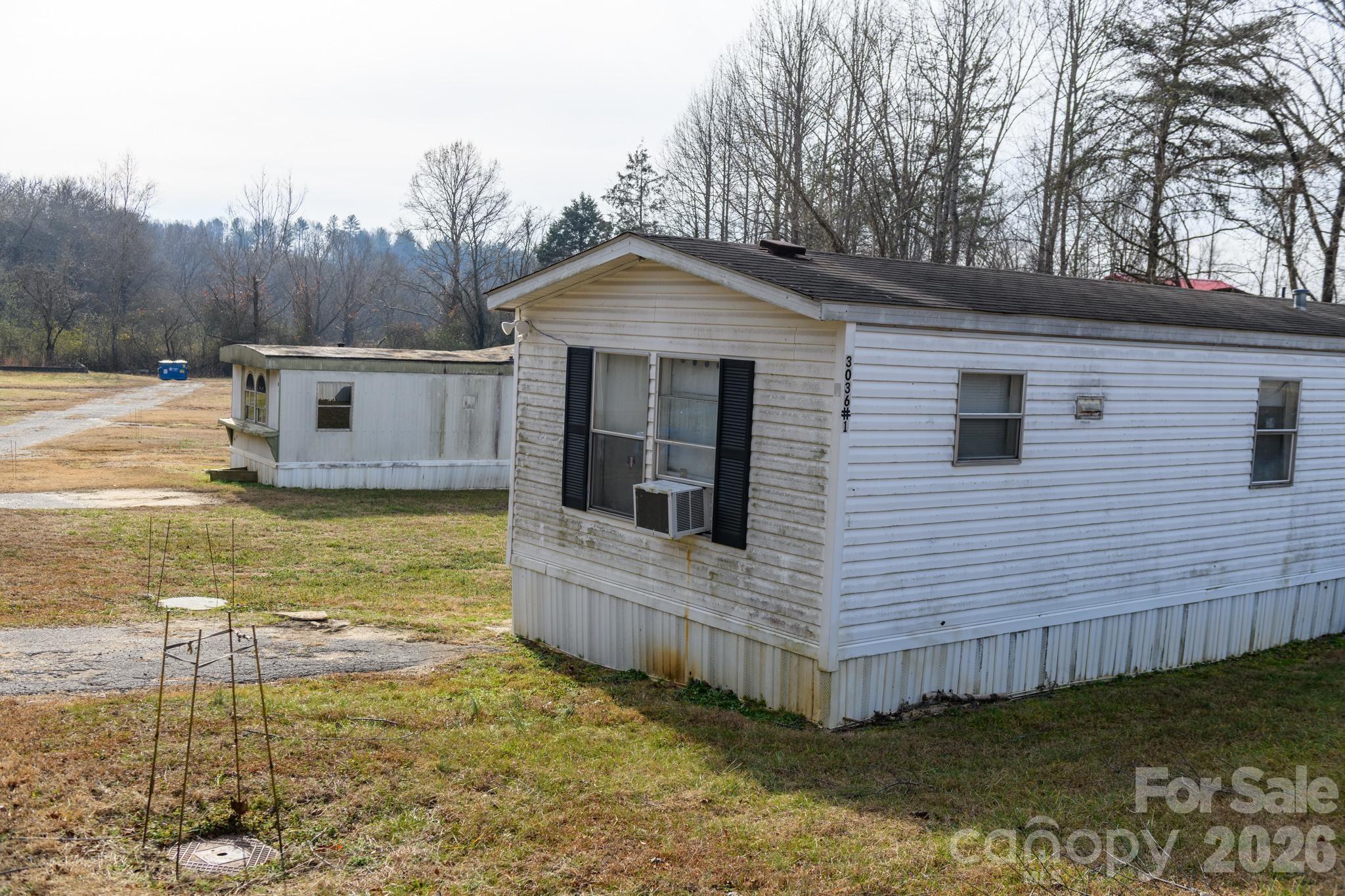 3036 Highway 18 Morganton, NC 28655 - Photo 6 of 28 a view of a house with a yard