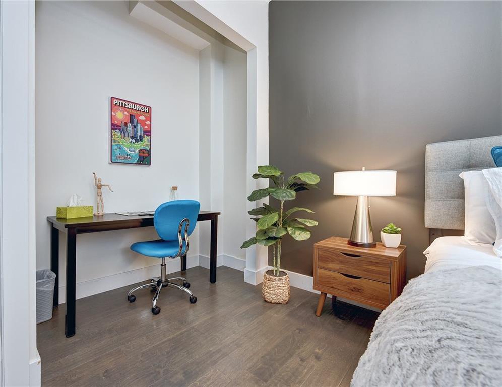 103 57th Street Pittsburgh, PA 15201 - Photo 38 of 49 a living room with furniture and a potted plant on table