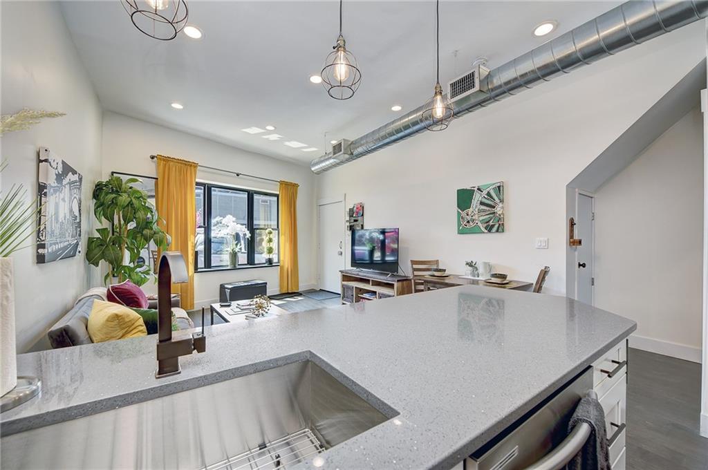 103 57th Street Pittsburgh, PA 15201 - Photo 41 of 49 a kitchen with sink cabinets and counter