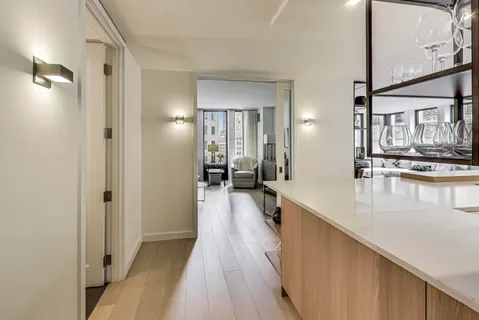 a view of a living room with a wooden floor