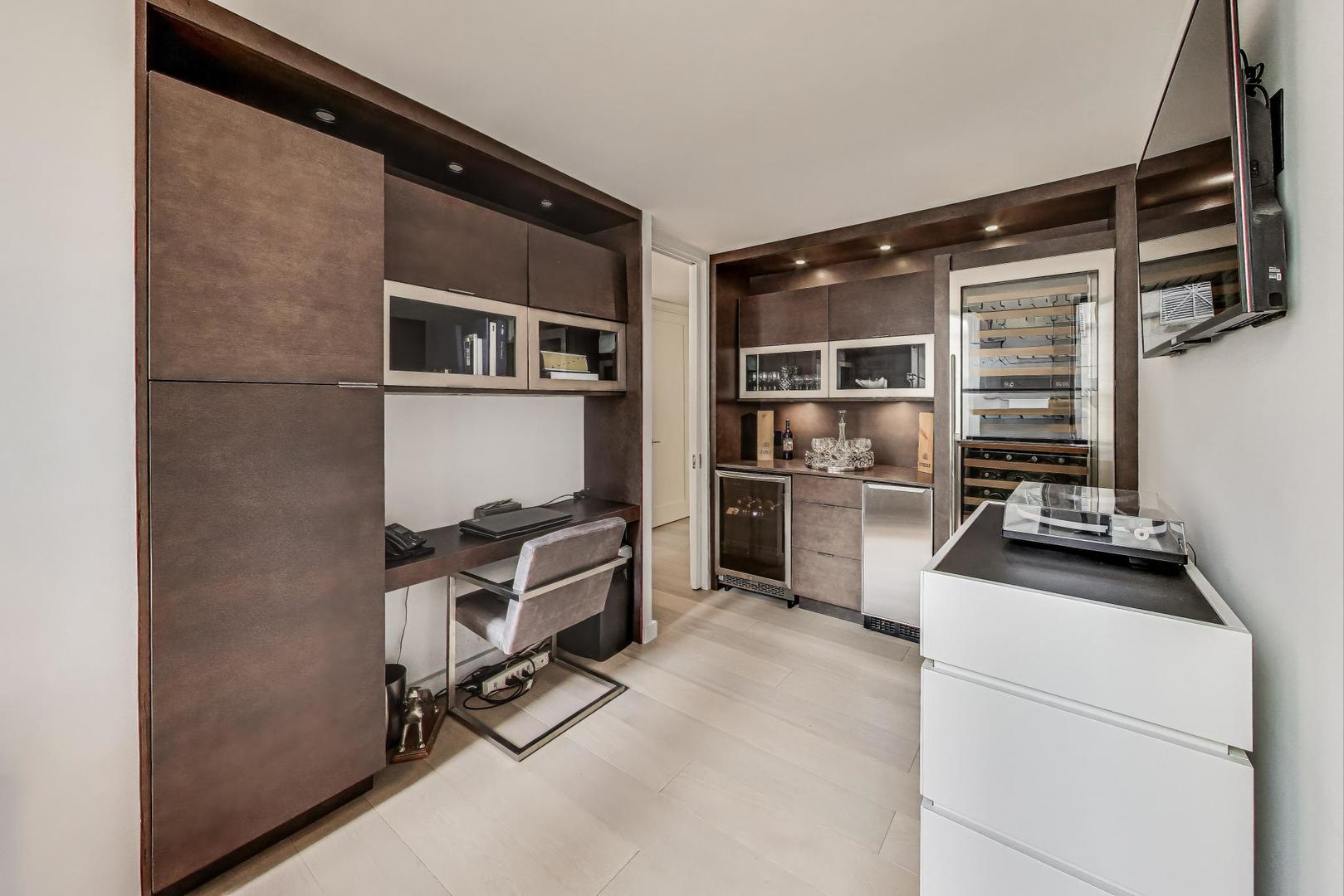 100 East Walton Street, Unit 15DE Chicago, IL 60611 - Photo 9 of 26 a room with storage and utility