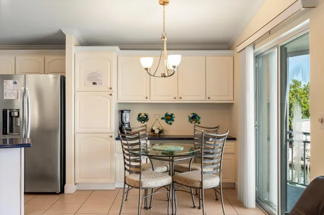 a living room with stainless steel appliances kitchen island granite countertop furniture and a kitchen view