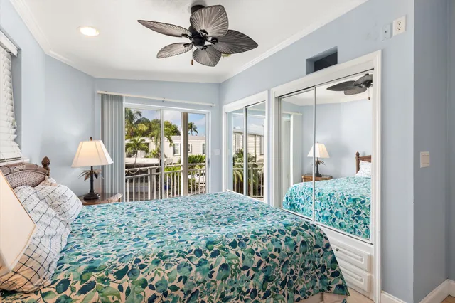 a bathroom with a granite countertop sink toilet mirror and shower
