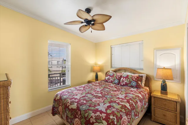 a vase of flowers sitting on a table with a vase of flowers